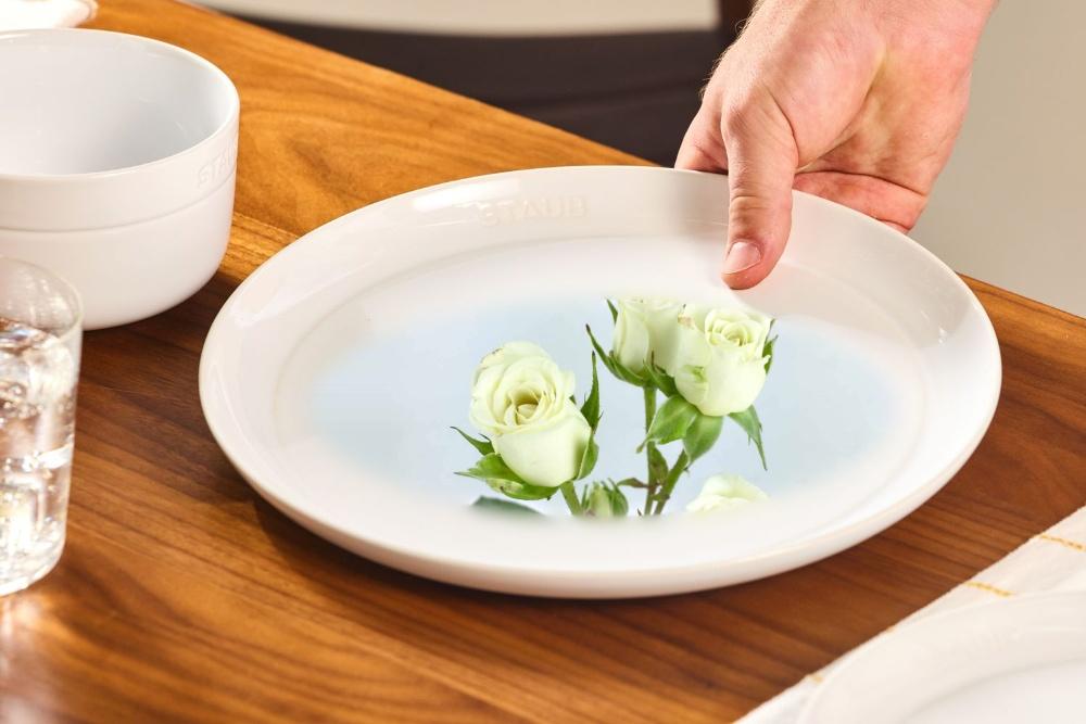 Roses blended into a hole in the plate